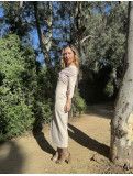 Vestido de fiesta combinando con gasa en color beige.