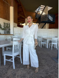 Conjunto de fiesta en tejido perforado color blanco.
