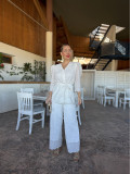 Conjunto de fiesta en tejido perforado color blanco.