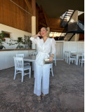 Conjunto de fiesta en tejido perforado color blanco.