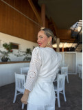 Conjunto de fiesta en tejido perforado color blanco.