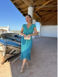 Vestido midi de fiesta con corte en la cintura y manga corta. Vestido midi de fiesta con corte en la cintura y manga corta.