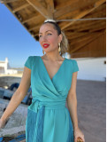 Vestido midi de fiesta con corte en la cintura y manga corta. Vestido midi de fiesta con corte en la cintura y manga corta.