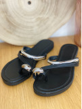Sandalias planas negras de polipiel.