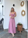 Conjunto de lino de dos piezas, formado por top y falda. Conjunto de lino de dos piezas, formado por top y falda.