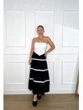 Falda midi de vuelo adornada con tira de ondulina, ideal para tus look Falda midi de vuelo adornada con tira de ondulina, ideal para tus look