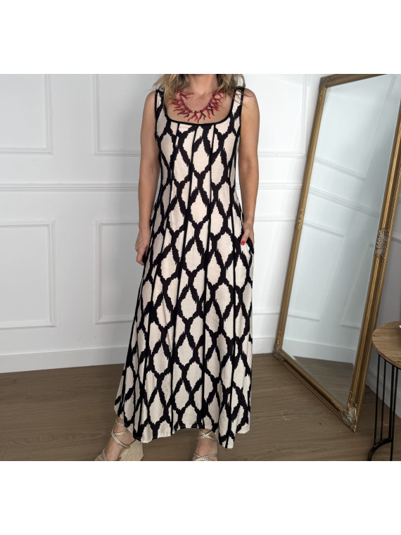 Vestido en tirantes anchos con estampado de manchas muy original. Vestido en tirantes anchos con estampado de manchas muy original.