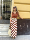 Falda midi de vuelo con estampado de rayas beige y marrón. Falda midi de vuelo con estampado de rayas beige y marrón.